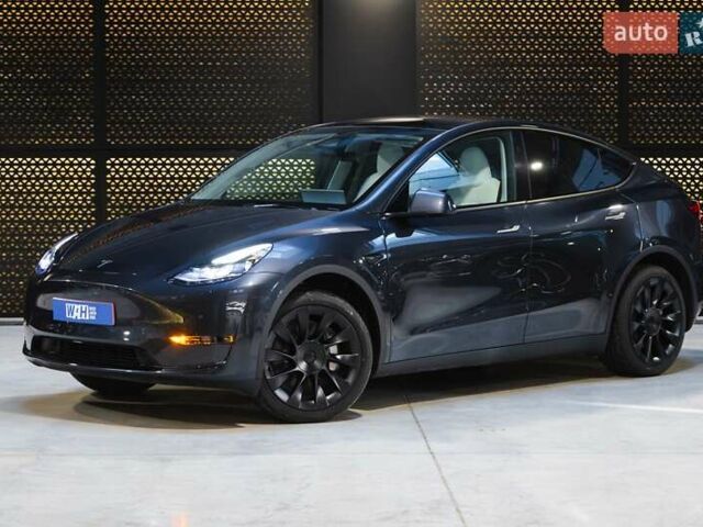 Серый Тесла Model Y, объемом двигателя 0 л и пробегом 1 тыс. км за 35990 $, фото 1 на Automoto.ua