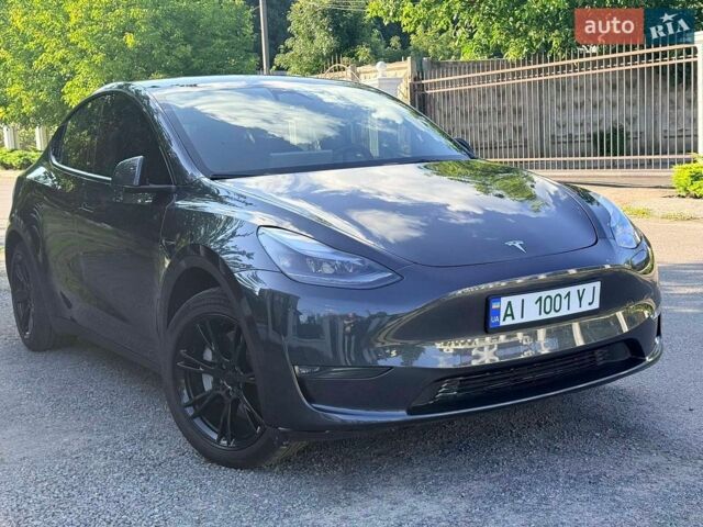 Серый Тесла Model Y, объемом двигателя 0 л и пробегом 48 тыс. км за 27600 $, фото 1 на Automoto.ua