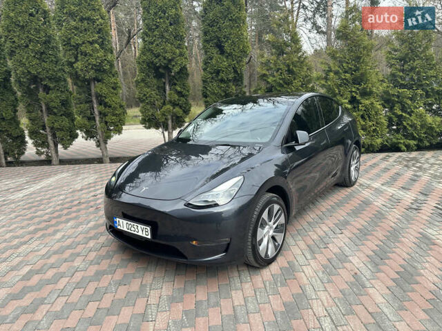 Серый Тесла Model Y, объемом двигателя 0 л и пробегом 15 тыс. км за 34500 $, фото 1 на Automoto.ua