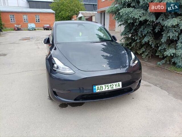Серый Тесла Model Y, объемом двигателя 0 л и пробегом 24 тыс. км за 24800 $, фото 1 на Automoto.ua