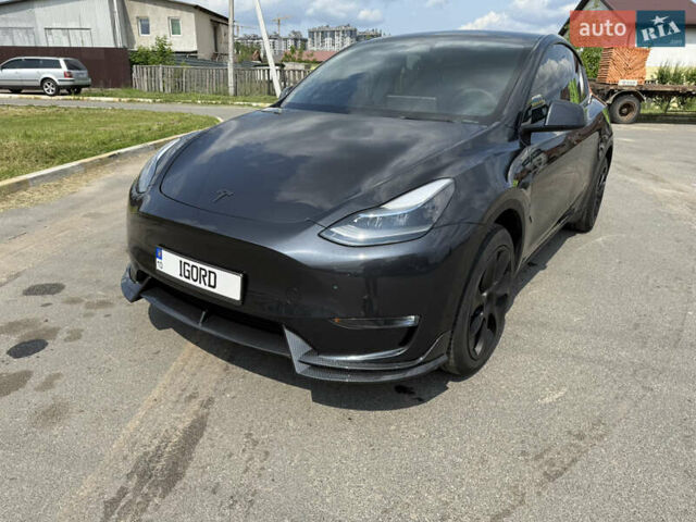 Серый Тесла Model Y, объемом двигателя 0 л и пробегом 19 тыс. км за 38000 $, фото 1 на Automoto.ua