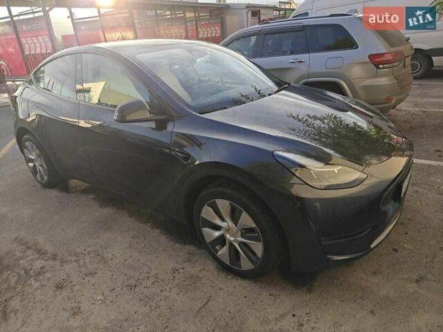 Серый Тесла Model Y, объемом двигателя 0 л и пробегом 21 тыс. км за 34000 $, фото 1 на Automoto.ua