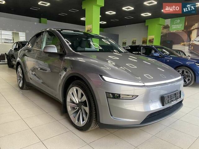 Серый Тесла Model Y, объемом двигателя 0 л и пробегом 1 тыс. км за 70224 $, фото 1 на Automoto.ua