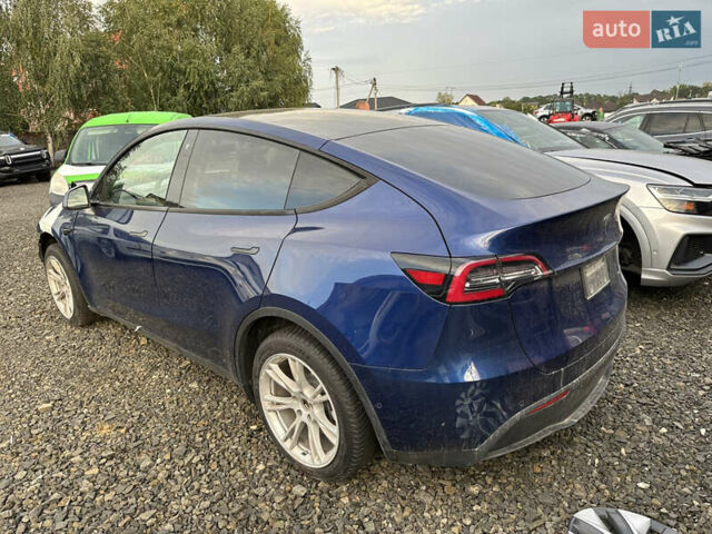 Синий Тесла Model Y, объемом двигателя 0 л и пробегом 186 тыс. км за 16000 $, фото 1 на Automoto.ua