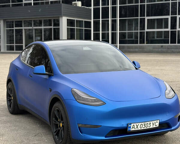 Синий Тесла Model Y, объемом двигателя 0 л и пробегом 55 тыс. км за 23800 $, фото 1 на Automoto.ua