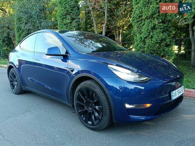 Синій Тесла Model Y, об'ємом двигуна 0 л та пробігом 65 тис. км за 23200 $, фото 1 на Automoto.ua