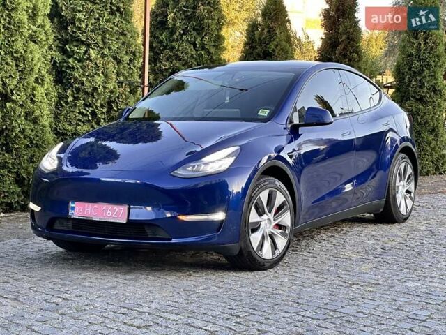 Синій Тесла Model Y, об'ємом двигуна 0 л та пробігом 163 тис. км за 20900 $, фото 1 на Automoto.ua