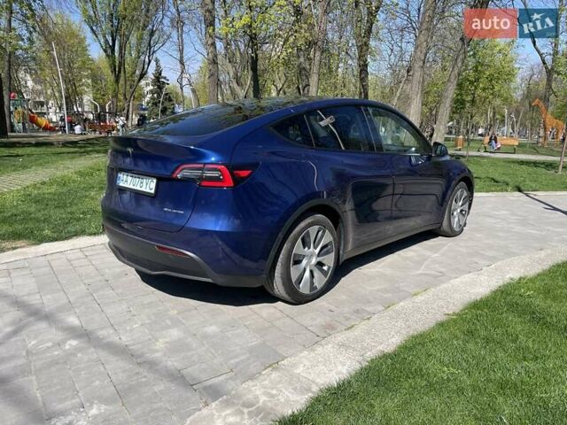 Синий Тесла Model Y, объемом двигателя 0 л и пробегом 115 тыс. км за 22800 $, фото 1 на Automoto.ua