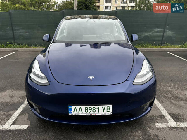 Синій Тесла Model Y, об'ємом двигуна 0 л та пробігом 82 тис. км за 26500 $, фото 1 на Automoto.ua