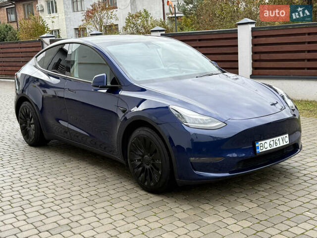 Синий Тесла Model Y, объемом двигателя 0 л и пробегом 145 тыс. км за 20700 $, фото 1 на Automoto.ua