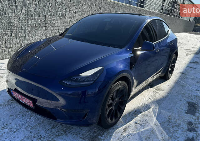 Синий Тесла Model Y, объемом двигателя 0 л и пробегом 83 тыс. км за 19900 $, фото 1 на Automoto.ua