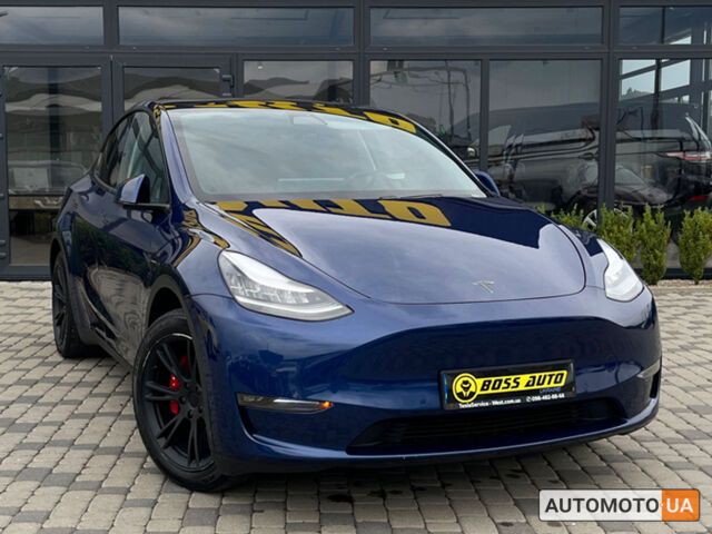 Синий Тесла Model Y, объемом двигателя 75 л и пробегом 107 тыс. км за 27000 $, фото 1 на Automoto.ua