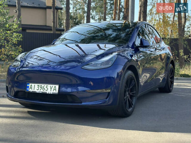 Синій Тесла Model Y, об'ємом двигуна 0 л та пробігом 94 тис. км за 24000 $, фото 1 на Automoto.ua