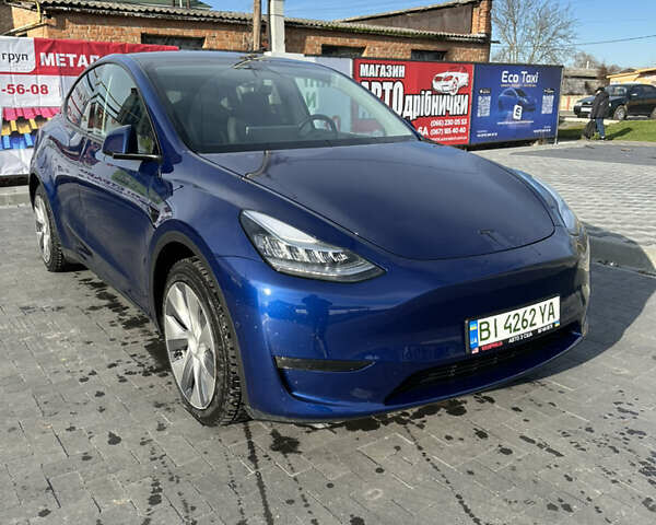 Синій Тесла Model Y, об'ємом двигуна 0 л та пробігом 51 тис. км за 23499 $, фото 1 на Automoto.ua
