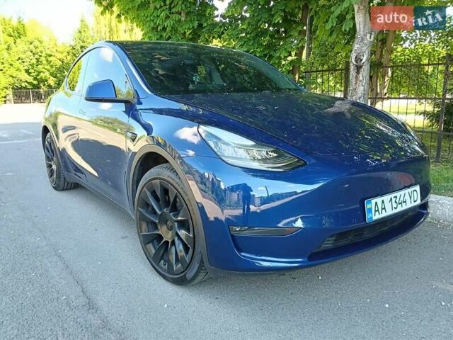 Синий Тесла Model Y, объемом двигателя 0 л и пробегом 65 тыс. км за 25000 $, фото 1 на Automoto.ua