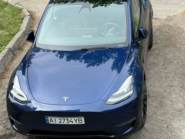Синий Тесла Model Y, объемом двигателя 0 л и пробегом 90 тыс. км за 20000 $, фото 1 на Automoto.ua