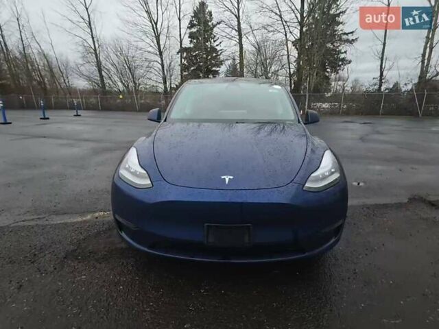 Синий Тесла Model Y, объемом двигателя 0 л и пробегом 63 тыс. км за 18000 $, фото 1 на Automoto.ua