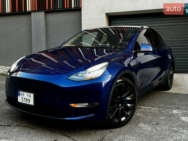 Синій Тесла Model Y, об'ємом двигуна 0 л та пробігом 84 тис. км за 24500 $, фото 1 на Automoto.ua
