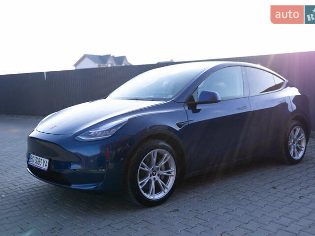 Синий Тесла Model Y, объемом двигателя 0 л и пробегом 42 тыс. км за 27000 $, фото 1 на Automoto.ua