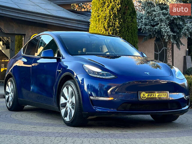 Синий Тесла Model Y, объемом двигателя 0 л и пробегом 72 тыс. км за 25750 $, фото 1 на Automoto.ua