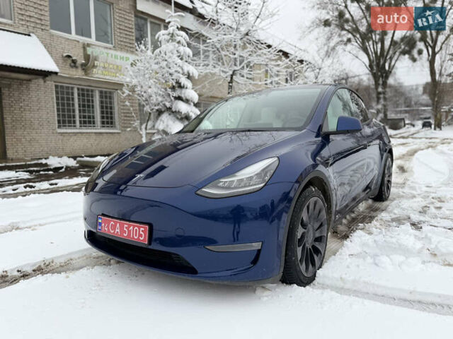 Синий Тесла Model Y, объемом двигателя 0 л и пробегом 63 тыс. км за 27000 $, фото 1 на Automoto.ua