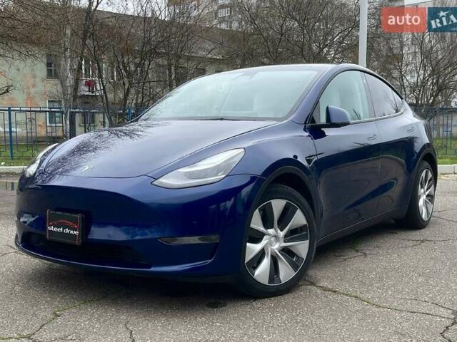 Синий Тесла Model Y, объемом двигателя 0 л и пробегом 130 тыс. км за 23500 $, фото 1 на Automoto.ua