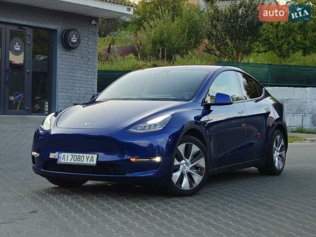 Синий Тесла Model Y, объемом двигателя 0 л и пробегом 99 тыс. км за 26500 $, фото 1 на Automoto.ua