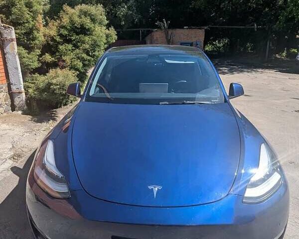 Синий Тесла Model Y, объемом двигателя 0 л и пробегом 84 тыс. км за 28500 $, фото 1 на Automoto.ua