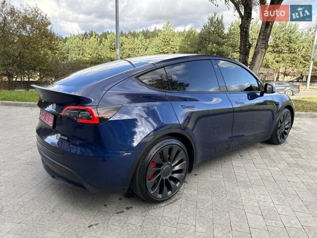 Синій Тесла Model Y, об'ємом двигуна 0 л та пробігом 88 тис. км за 22999 $, фото 1 на Automoto.ua
