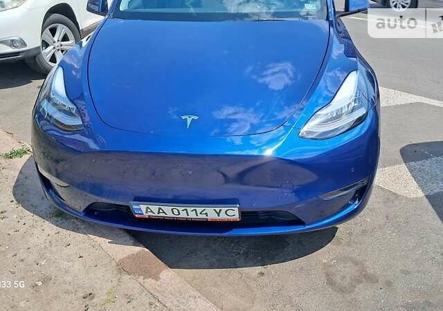 Синий Тесла Model Y, объемом двигателя 0 л и пробегом 47 тыс. км за 23500 $, фото 1 на Automoto.ua