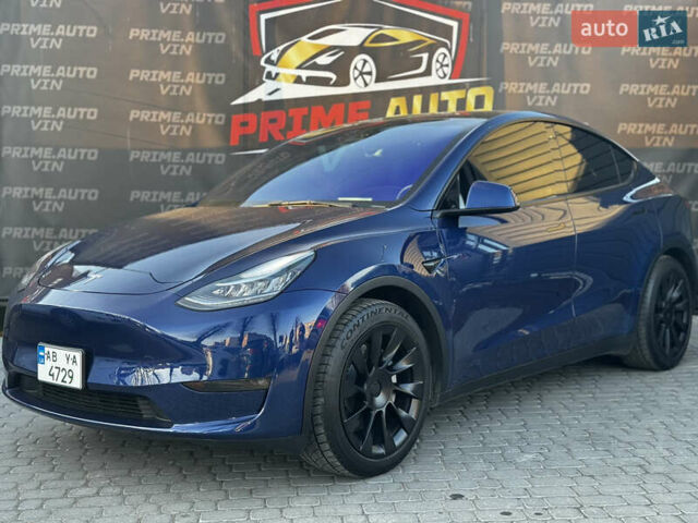 Синий Тесла Model Y, объемом двигателя 0 л и пробегом 83 тыс. км за 26999 $, фото 1 на Automoto.ua