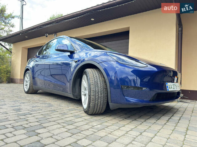 Синий Тесла Model Y, объемом двигателя 0 л и пробегом 57 тыс. км за 24300 $, фото 1 на Automoto.ua