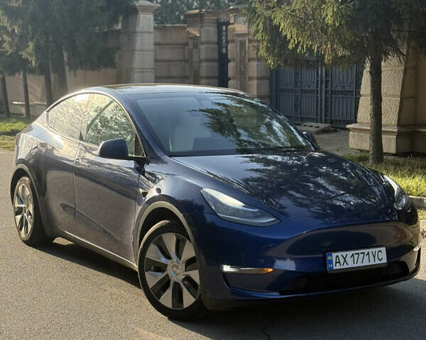 Синий Тесла Model Y, объемом двигателя 0 л и пробегом 97 тыс. км за 26500 $, фото 1 на Automoto.ua