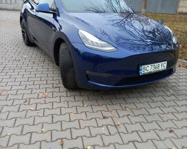 Синий Тесла Model Y, объемом двигателя 0 л и пробегом 91 тыс. км за 25850 $, фото 1 на Automoto.ua