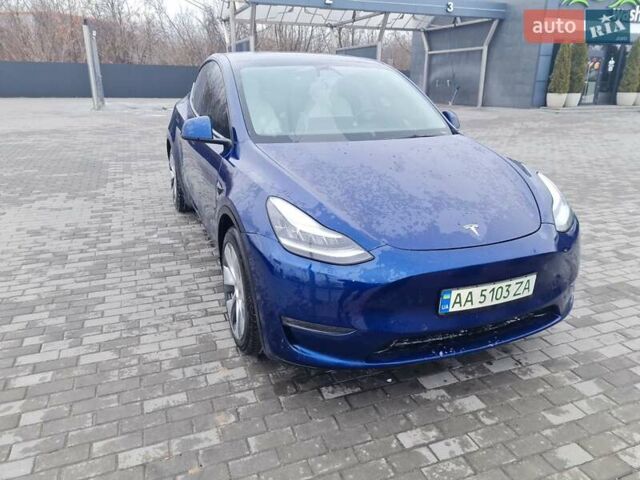 Синий Тесла Model Y, объемом двигателя 0 л и пробегом 45 тыс. км за 25999 $, фото 1 на Automoto.ua