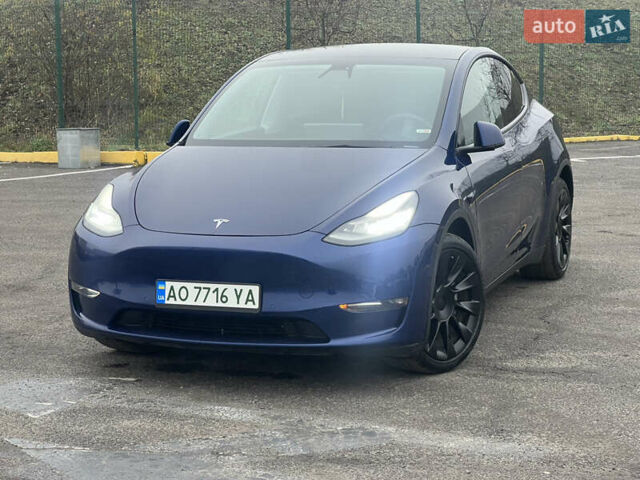 Синий Тесла Model Y, объемом двигателя 0 л и пробегом 125 тыс. км за 25997 $, фото 1 на Automoto.ua