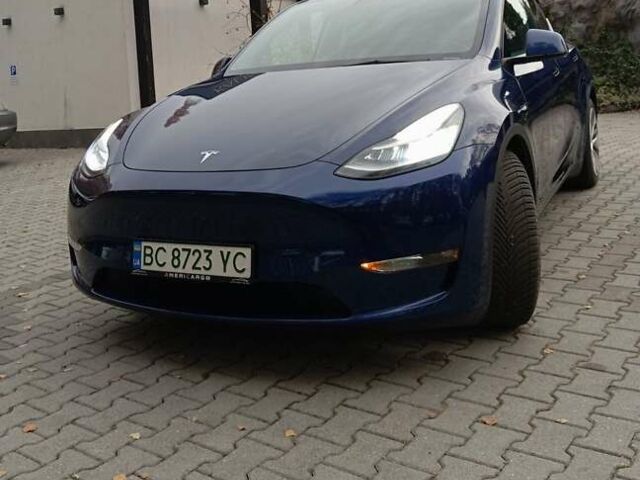 Синій Тесла Model Y, об'ємом двигуна 0 л та пробігом 51 тис. км за 25999 $, фото 1 на Automoto.ua