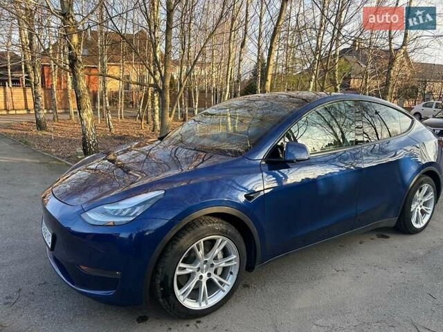 Синий Тесла Model Y, объемом двигателя 0 л и пробегом 62 тыс. км за 25800 $, фото 1 на Automoto.ua