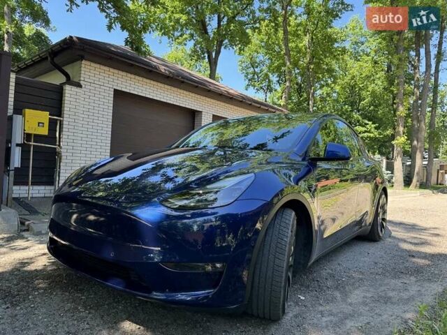 Синий Тесла Model Y, объемом двигателя 0 л и пробегом 82 тыс. км за 28100 $, фото 1 на Automoto.ua
