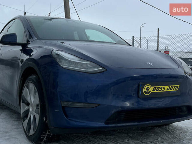 Синий Тесла Model Y, объемом двигателя 0 л и пробегом 74 тыс. км за 26700 $, фото 1 на Automoto.ua