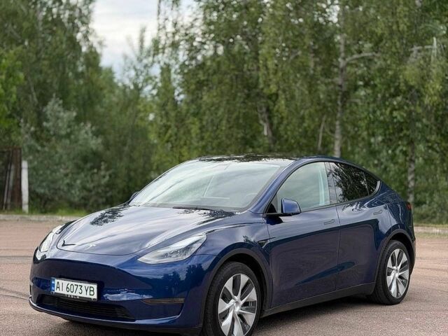Синий Тесла Model Y, объемом двигателя 0 л и пробегом 66 тыс. км за 23000 $, фото 1 на Automoto.ua
