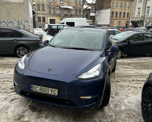 Синий Тесла Model Y, объемом двигателя 0 л и пробегом 96 тыс. км за 23200 $, фото 1 на Automoto.ua