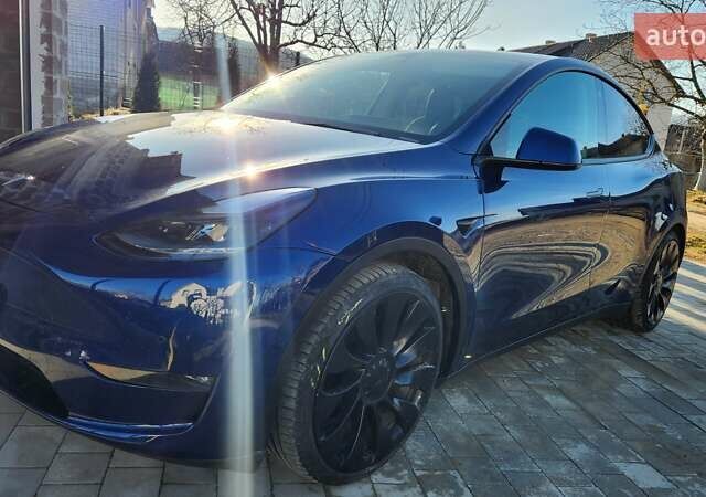 Синий Тесла Model Y, объемом двигателя 0 л и пробегом 44 тыс. км за 26700 $, фото 1 на Automoto.ua