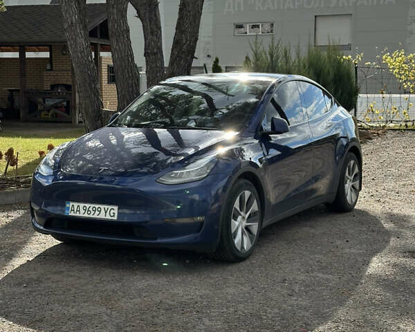 Синий Тесла Model Y, объемом двигателя 0 л и пробегом 116 тыс. км за 22999 $, фото 1 на Automoto.ua