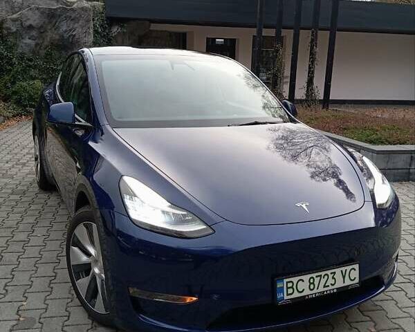 Синий Тесла Model Y, объемом двигателя 0 л и пробегом 51 тыс. км за 25999 $, фото 1 на Automoto.ua