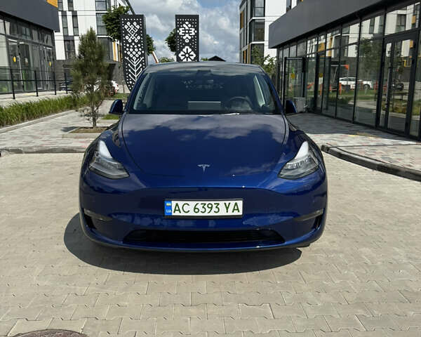 Синий Тесла Model Y, объемом двигателя 0 л и пробегом 83 тыс. км за 24999 $, фото 1 на Automoto.ua