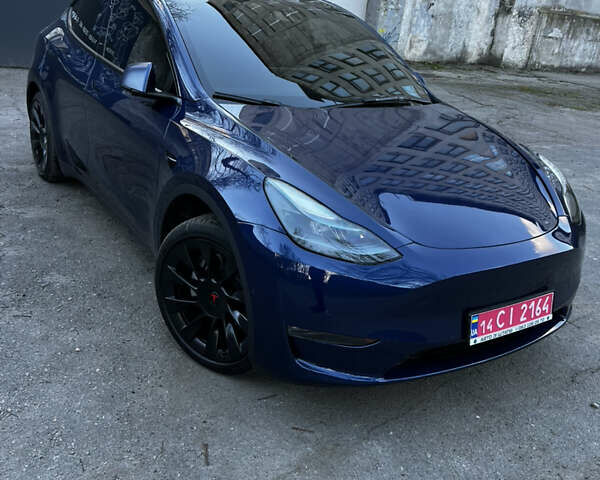 Синій Тесла Model Y, об'ємом двигуна 0 л та пробігом 76 тис. км за 23300 $, фото 1 на Automoto.ua