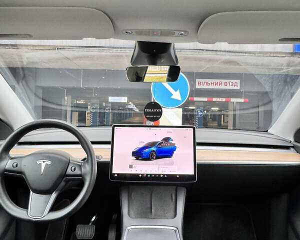 Синий Тесла Model Y, объемом двигателя 0 л и пробегом 104 тыс. км за 22900 $, фото 1 на Automoto.ua