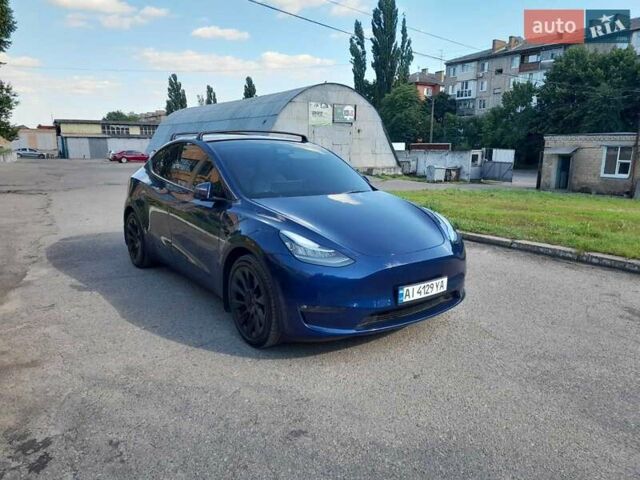 Синий Тесла Model Y, объемом двигателя 0 л и пробегом 44 тыс. км за 28000 $, фото 1 на Automoto.ua