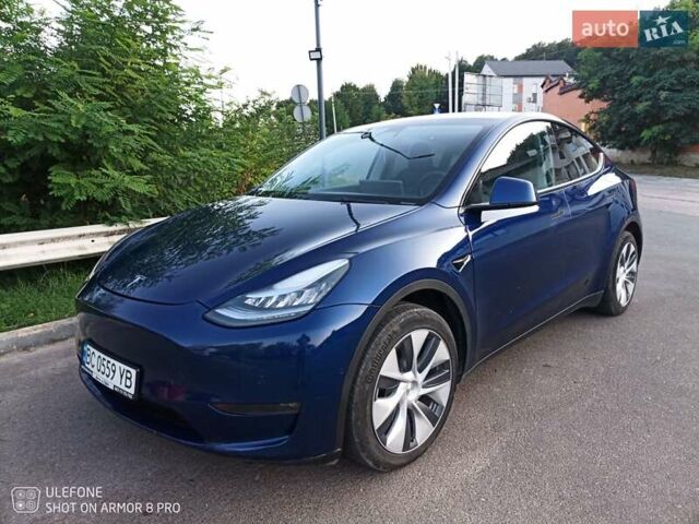 Синий Тесла Model Y, объемом двигателя 0 л и пробегом 24 тыс. км за 28300 $, фото 1 на Automoto.ua